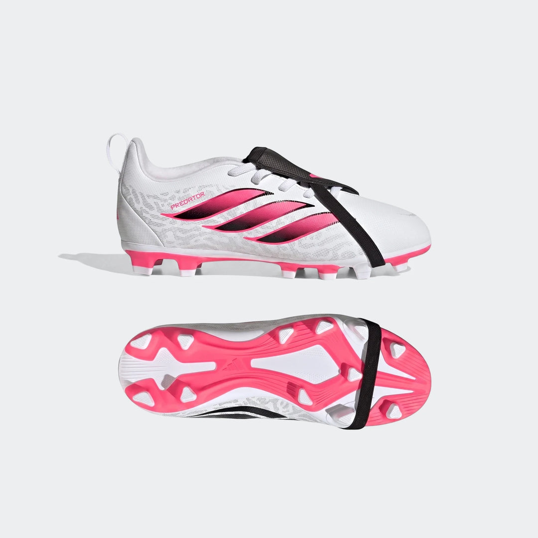 Kids' white, hot pink, and black Adidas Predator Club football boots with fold-over tongue, shown from side and sole views.