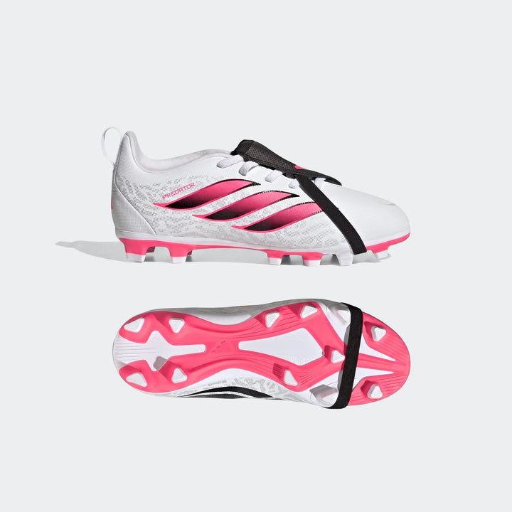 Kids' white, hot pink, and black Adidas Predator Club football boots with fold-over tongue, shown from side and sole views.
