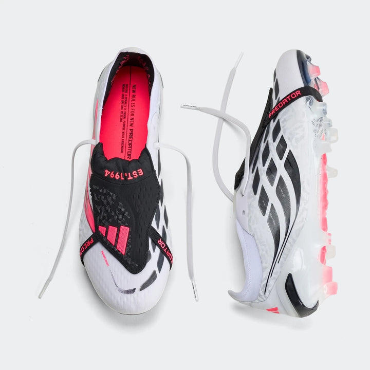 Pair of white, black, and pink Adidas Predator Elite Fold-Over Tongue Firm Ground Football Boots with untied laces, viewed