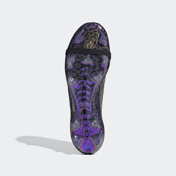 Predator Elite Ft Fg Kaka Edition football boots, featuring a unique purple leopard print and glossy finish, viewed from the