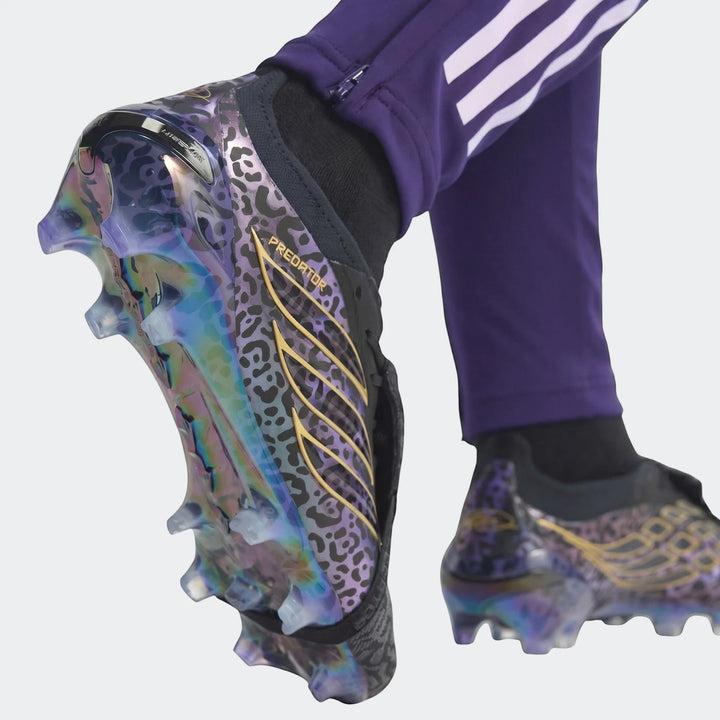 Close-up of iridescent purple and black cheetah print Predator Elite Ft Fg Kaka Edition Football Boots with gold details and