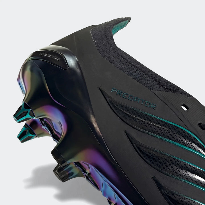 Close-up view of a black Predator Elite Ft Sg Eqt football boot with an iridescent sole and teal accents, designed for elite