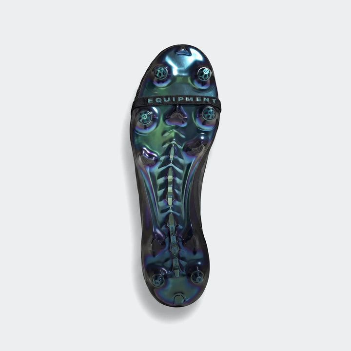 Predator Elite Ft Sg Eqt football boots, showcasing the iridescent sole with studs and a black midfoot strap.