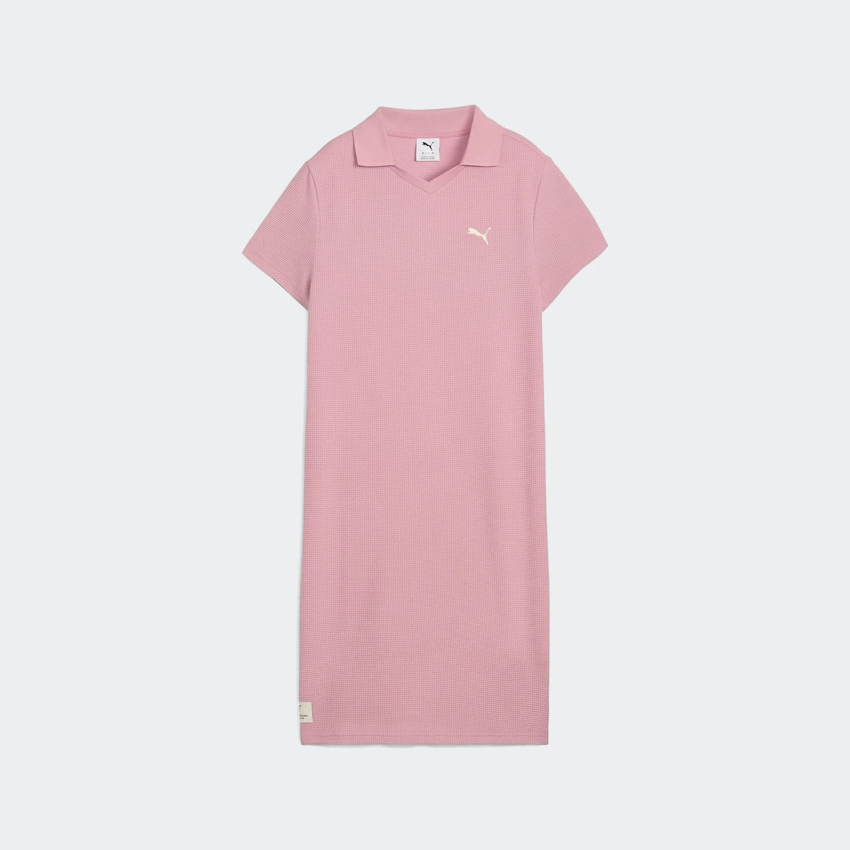 Pink Puma Class Pinnacle Dress for women, featuring a pique texture fabric, V-neck polo collar, and short sleeves, displayed