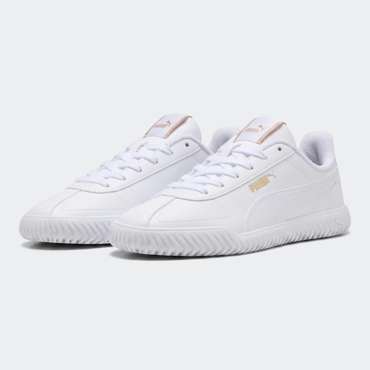 Puma Club Kayzer white low-top sneakers with gold branding, featuring a textured sole, shown from a slightly angled side
