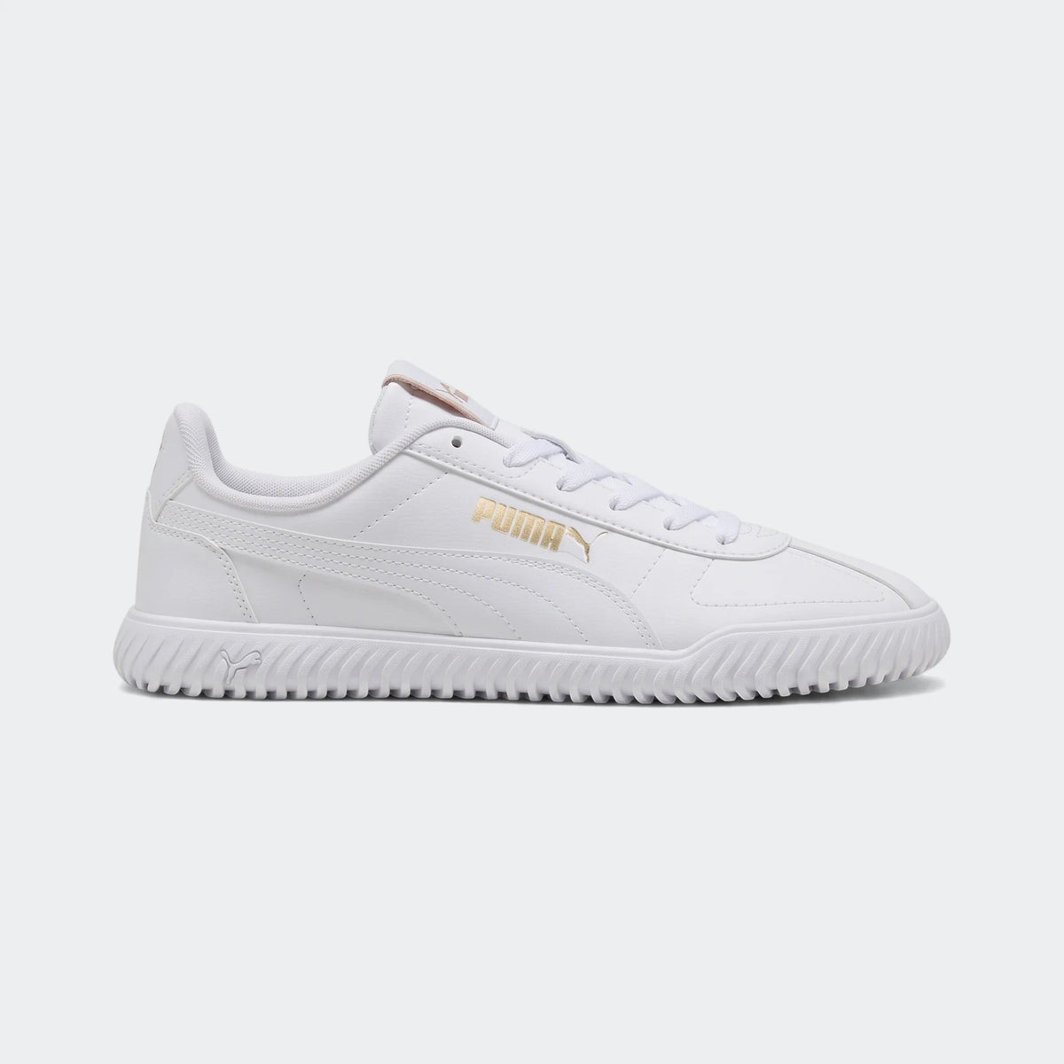 Puma Club Kayzer white sneakers, featuring gold branding on the side and a textured ridged sole, presented in a side profile