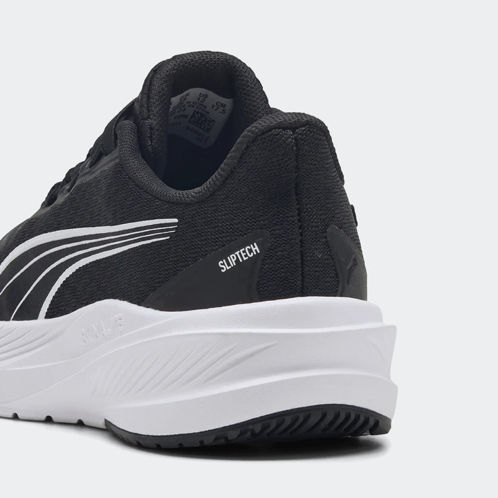 Rear quarter view of a black Puma Dasher Lite Sliptech 619Mdl running shoe with white accents and sole.
