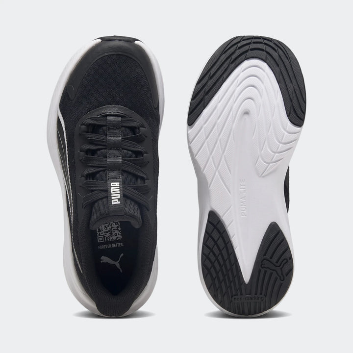 Black and white Puma Dasher Lite Sliptech sneakers, shown from a top-down perspective and the sole view, highlighting design.