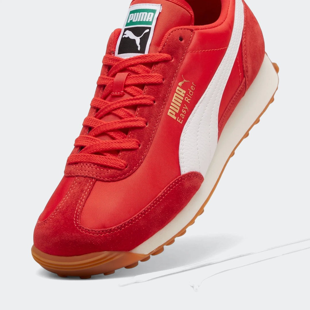 Puma Easy Rider Vintage Ps Red Sneakers with white Formstrip, red laces, suede and nylon upper, and gum rubber sole.