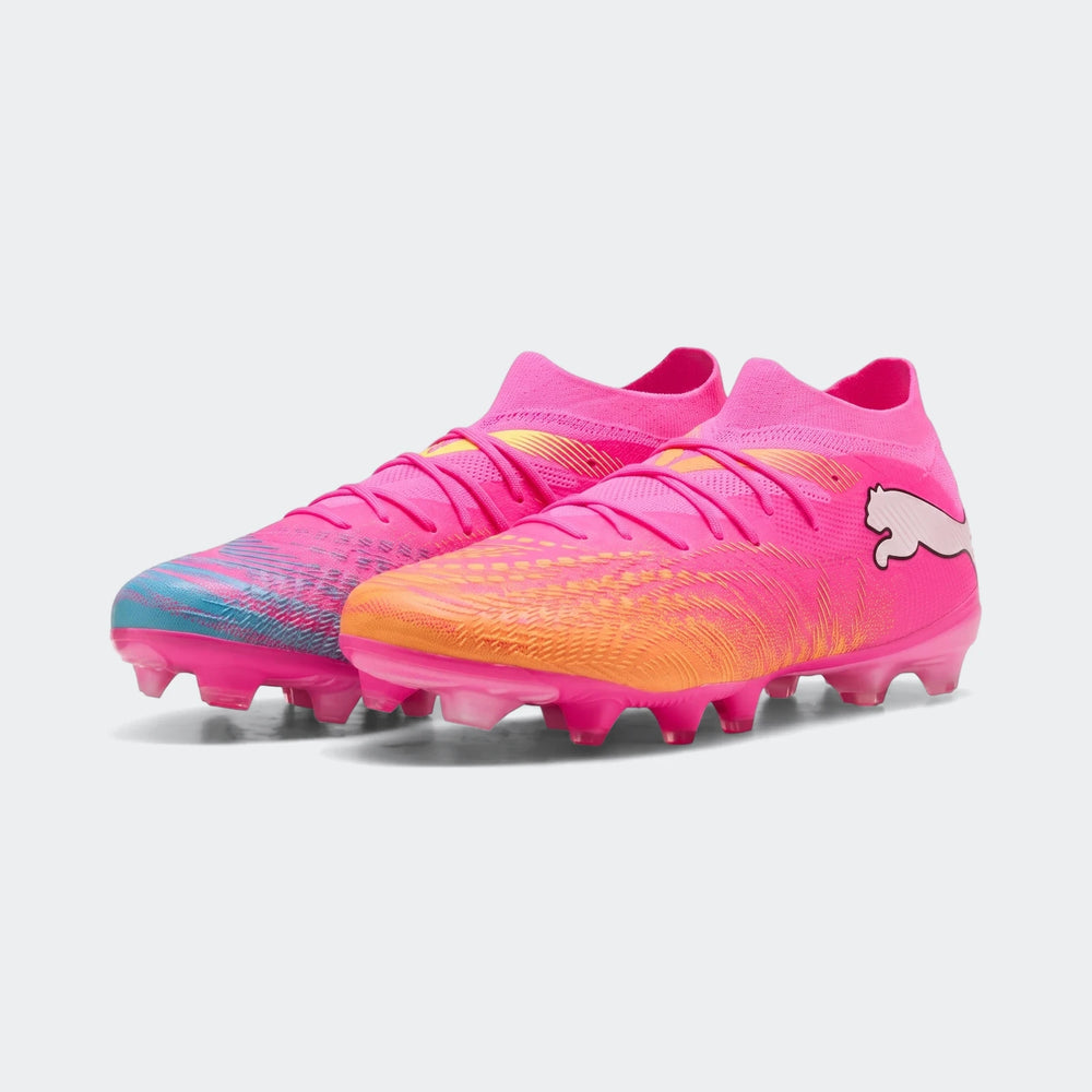 Unisex Puma Future 9 Match Fg/Ag football boots in vibrant pink, orange, and blue on a white background.