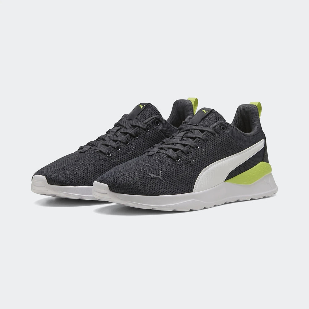 Puma Mens Anzarun Lite Sneakers in dark grey mesh with white side stripe, lime green heel accents, and white soles,