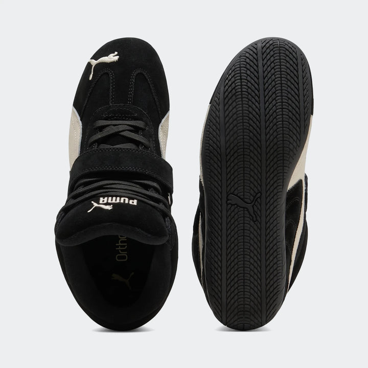 Black and white Puma Speedcat Wedge Og Women's Sneakers shown from both top and bottom views, showcasing the design.