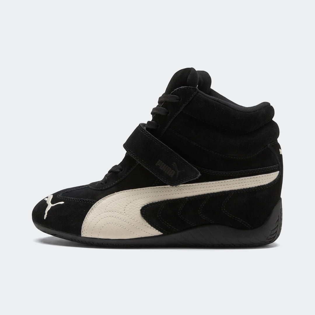 Black and cream Puma Speedcat Wedge Og women's high-top sneakers, featuring a suede upper and iconic formstrip.