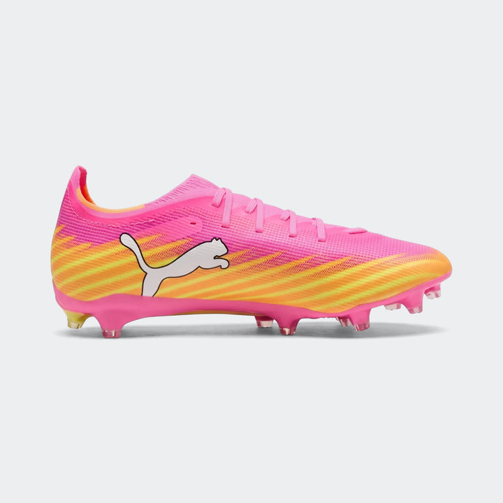 Puma Ultra 6 Match Fg/Ag football boots in vibrant pink and yellow with white logo, side view.