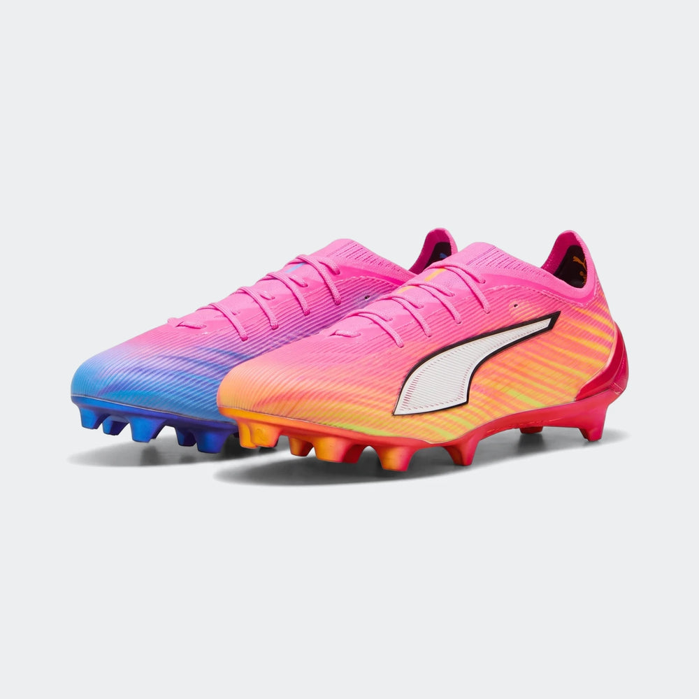 Pair of Puma Ultra 6 Ultimate FG Football Boots in vibrant pink, blue, yellow, and orange gradient colors, shown from the