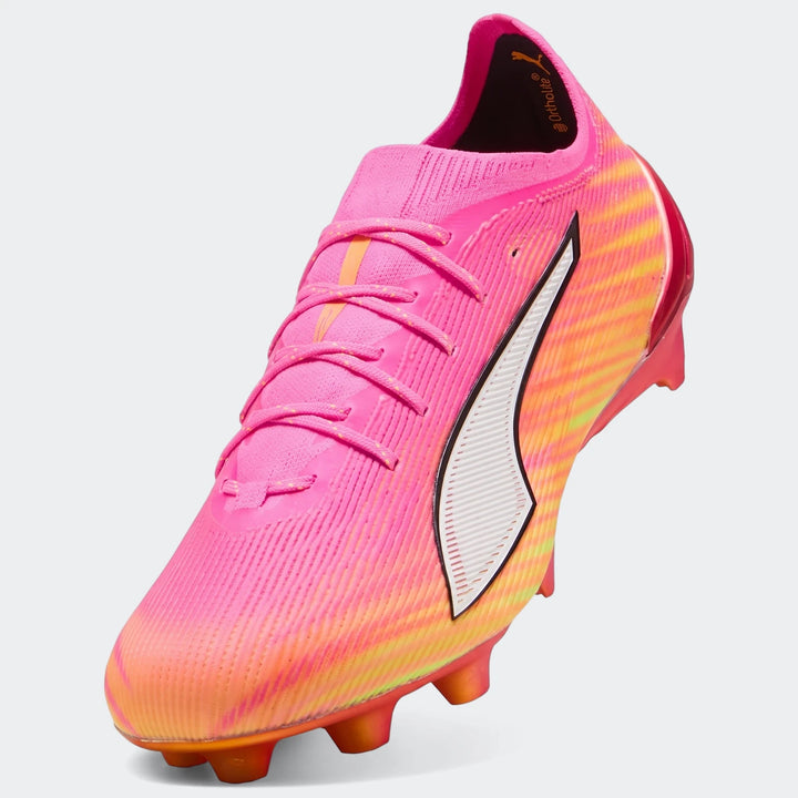 Bright pink and orange Puma Ultra 6 Ultimate FG Unisex Football Boots with a synthetic upper and orange studs.