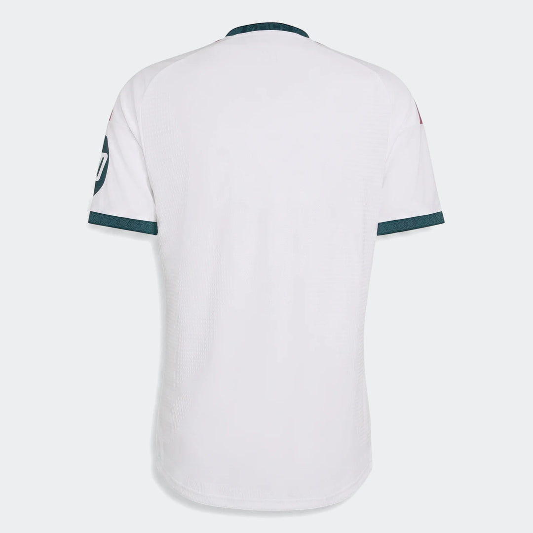Real Madrid 25/26 Authentic Home Jersey, white with dark green collar and cuffs, shown from the back.