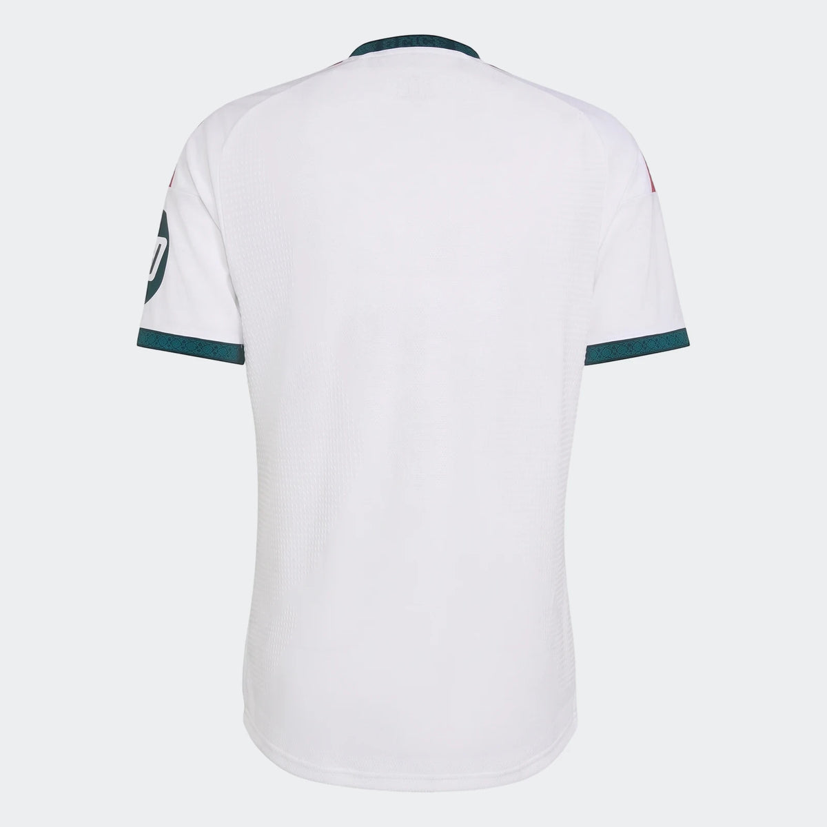 Back of a Real Madrid 25/26 Authentic Home Jersey in white with dark green collar and cuff trim, and subtle red accents.