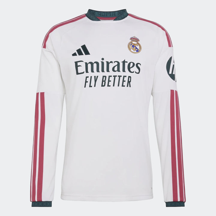White Real Madrid 25/26 long sleeve home jersey, featuring Adidas branding, the club crest, and Emirates sponsor logo on the