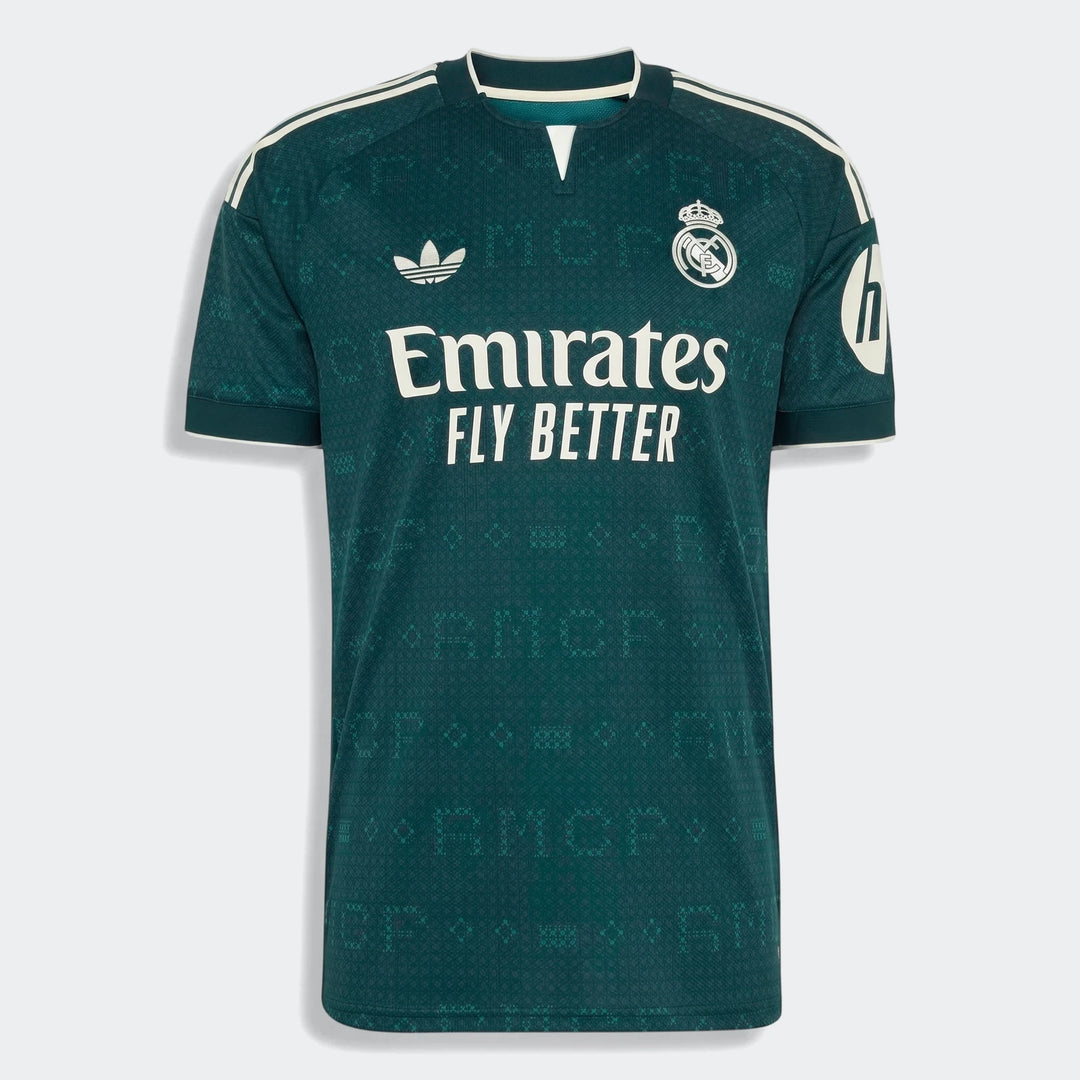 Real Madrid 26/27 Away Jersey in teal green, featuring white sponsor logo, Adidas stripes, and club crest, displayed