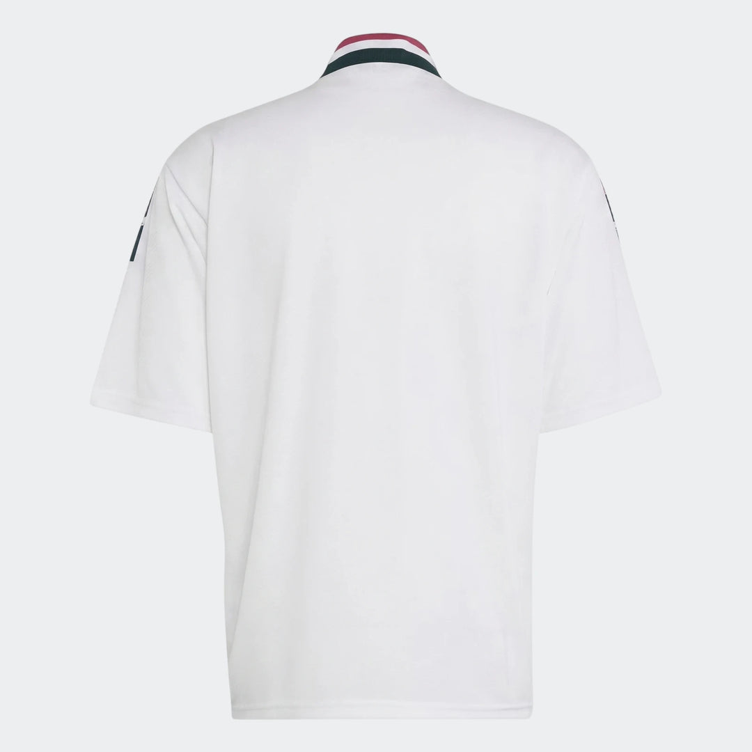 White Real Madrid Street Jersey, rear view, featuring a striped collar and textured short sleeves.
