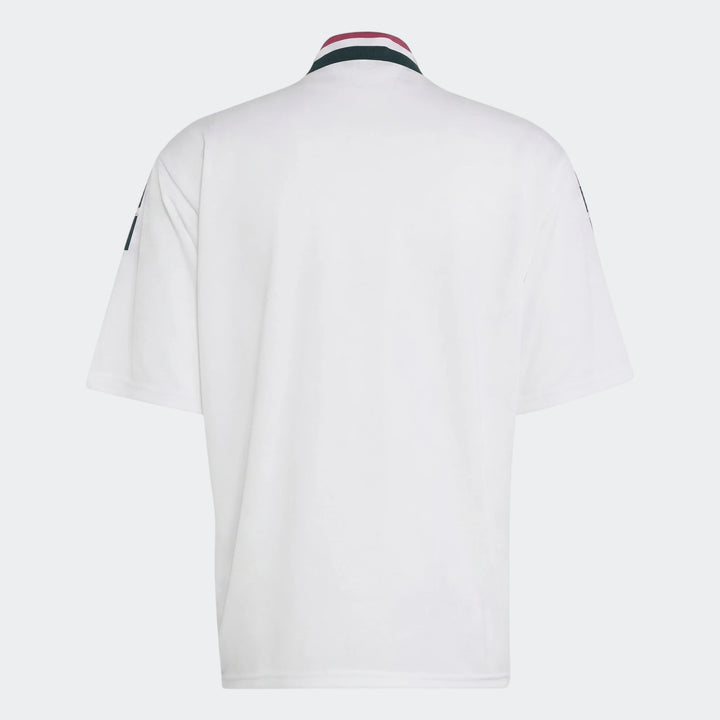 White Real Madrid Street Jersey, rear view, featuring a striped collar and textured short sleeves.