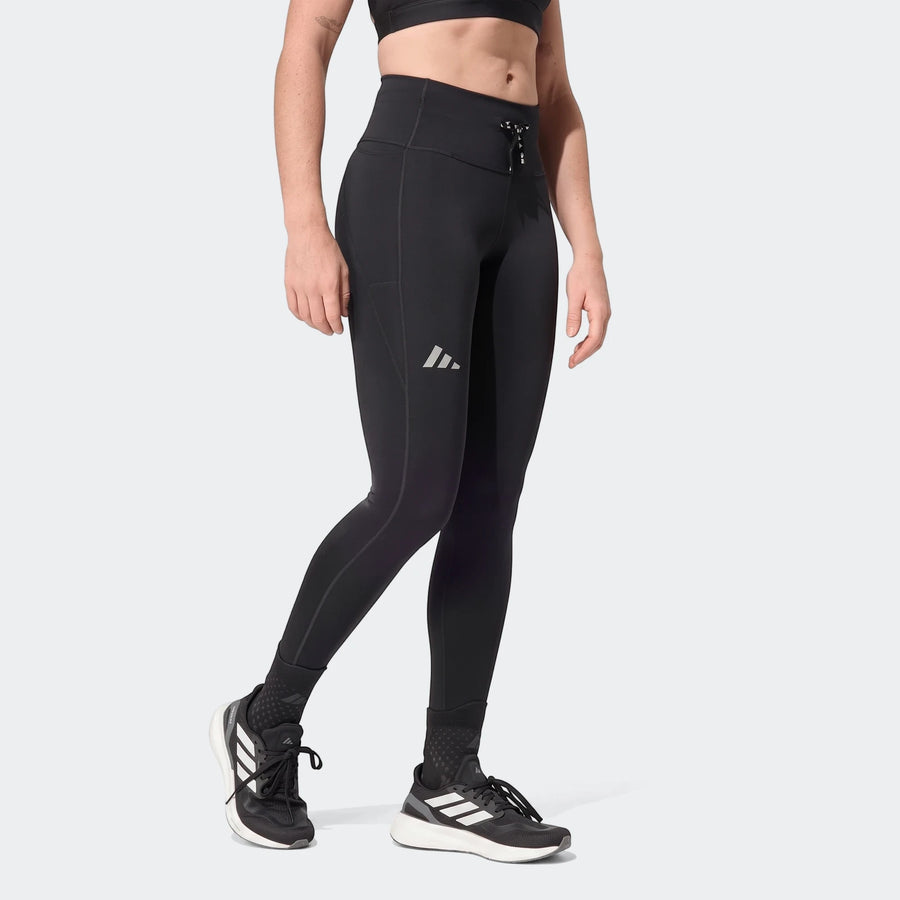 Black Run Essentials Full Length Leggings worn by a person, featuring an Adidas logo and side pocket, paired with athletic