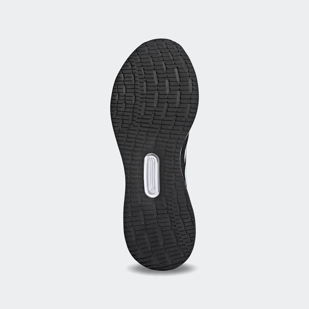 Bottom view of a black Runfalcon 5 sneaker sole, showcasing the detailed textured tread pattern and central white insert.