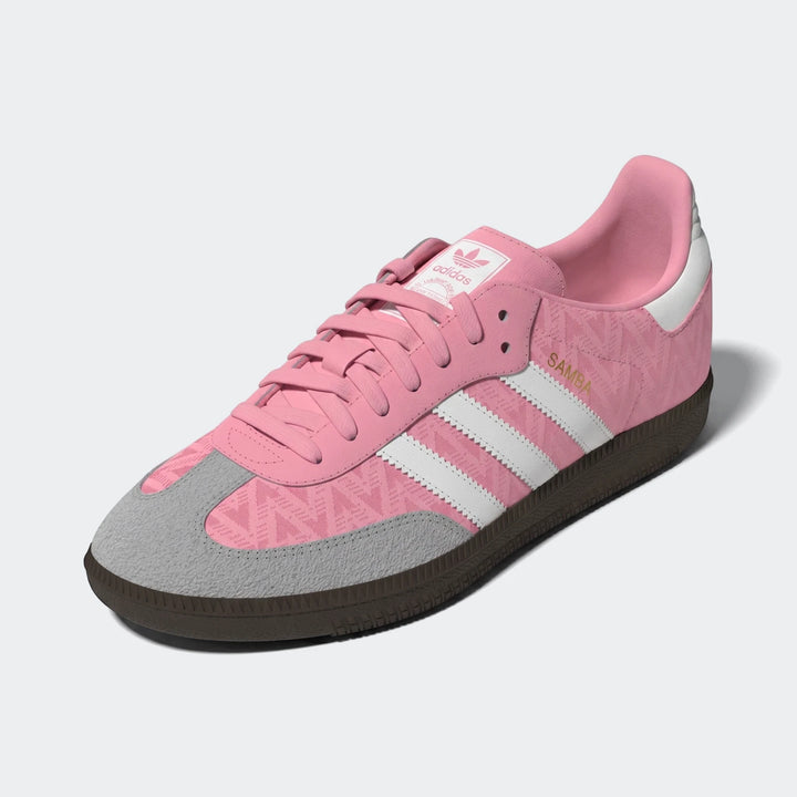 Samba OG Kids Shoes in pink with white three stripes, gray suede toe cap, and gum sole, shown in side view.