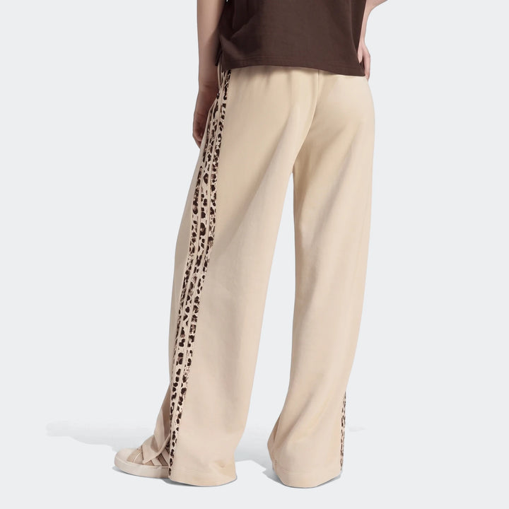 Beige Seasonal Essentials Animal Print 3-Stripes Joggers for women, featuring a wide-leg fit and brown animal print side