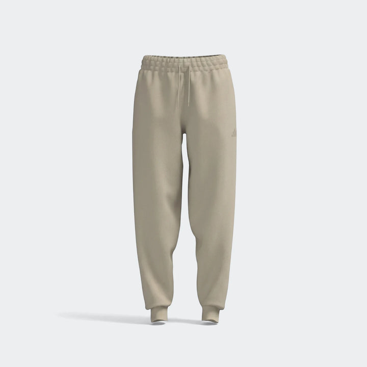 Beige slim fleece cuffed track pants, presented in a front view, highlighting their comfortable and casual design.