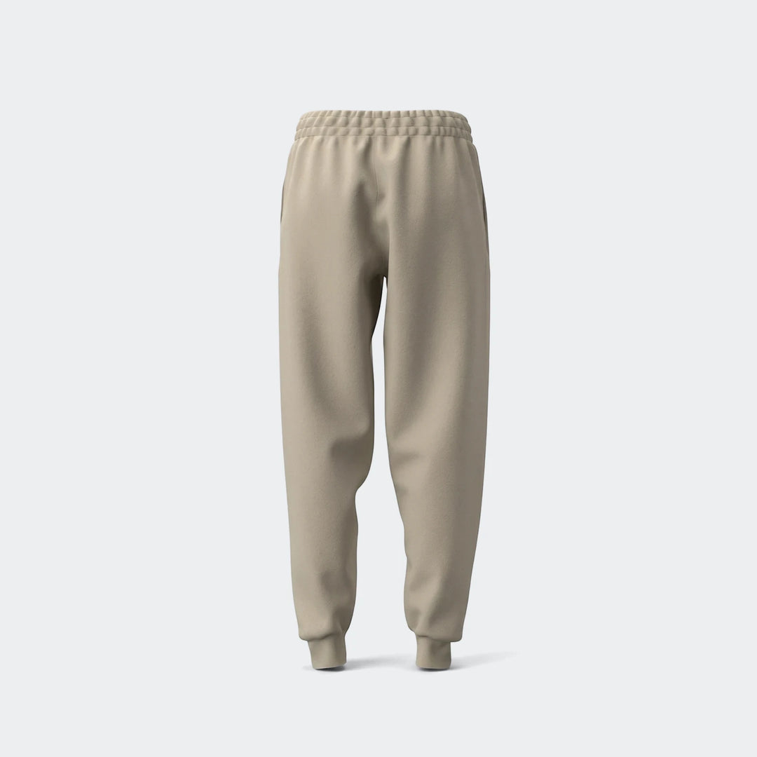 Beige slim fleece cuffed track pants in a simple front view, highlighting their comfortable fit and casual style.