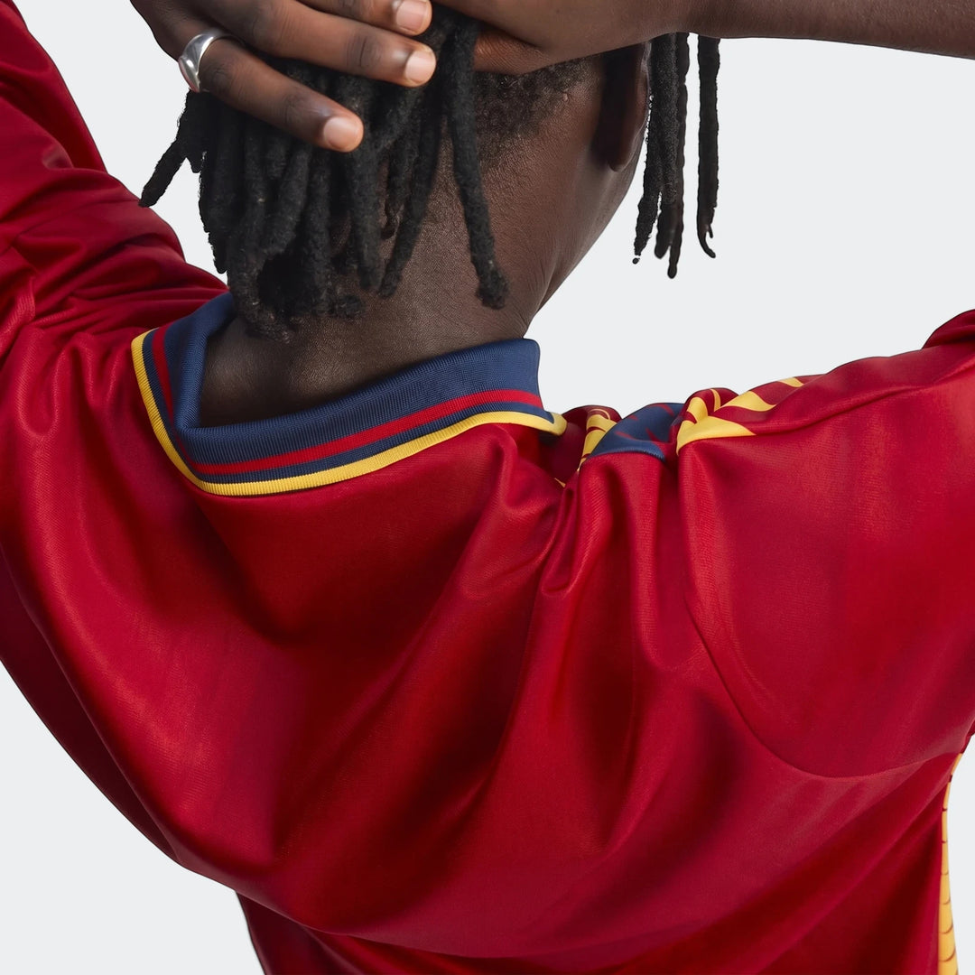 Spain 1994 Retro Home Jersey shown from the back, featuring a dark-skinned model with dreadlocks, wearing a silver ring.