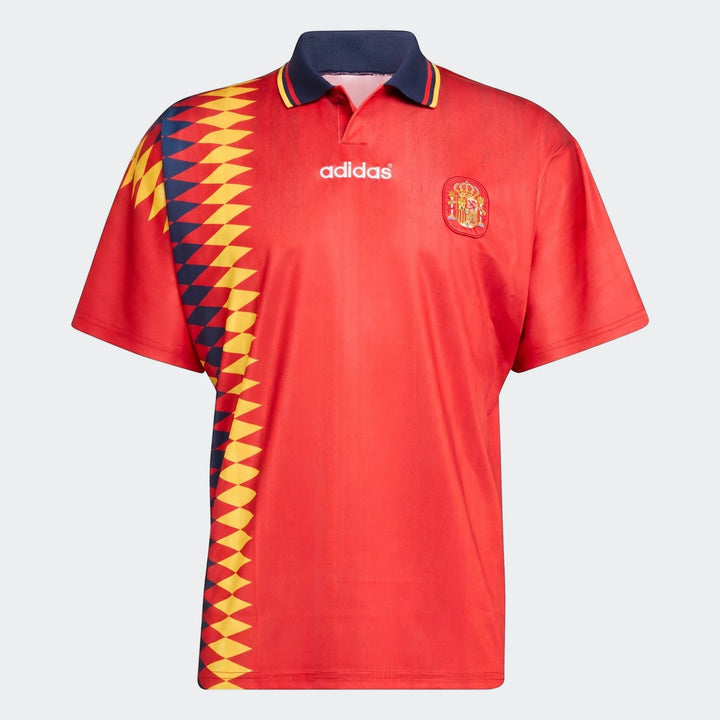 Spain 1994 Retro Home Jersey, a red short-sleeved football shirt with a blue polo collar and a geometric side pattern.
