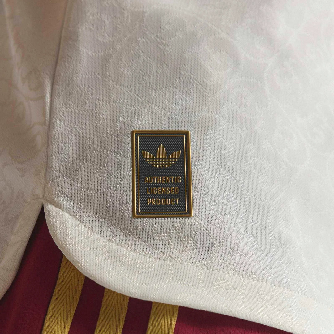Close-up of the white textured Spain 25/26 Authentic Away Jersey, featuring the Adidas Authentic Licensed Product label and