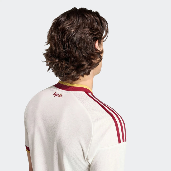 Spain 25/26 Authentic Away Jersey for men, white with red and yellow collar and shoulder stripes, shown from the back.
