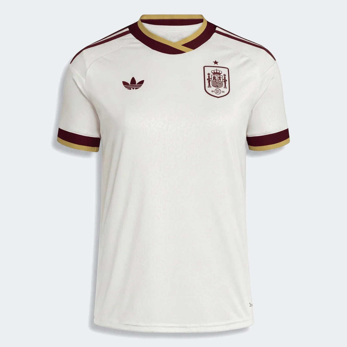 Women's Spain 25/26 away jersey in white with maroon and gold trim, featuring an Adidas logo and national crest.