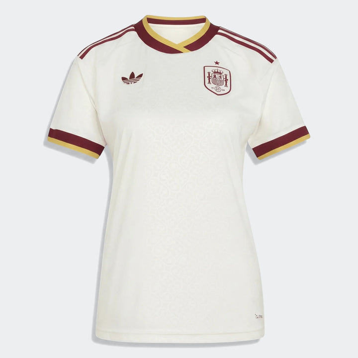 Women's Spain 25/26 Away Jersey in white with maroon and yellow details, featuring the Adidas logo and team crest.