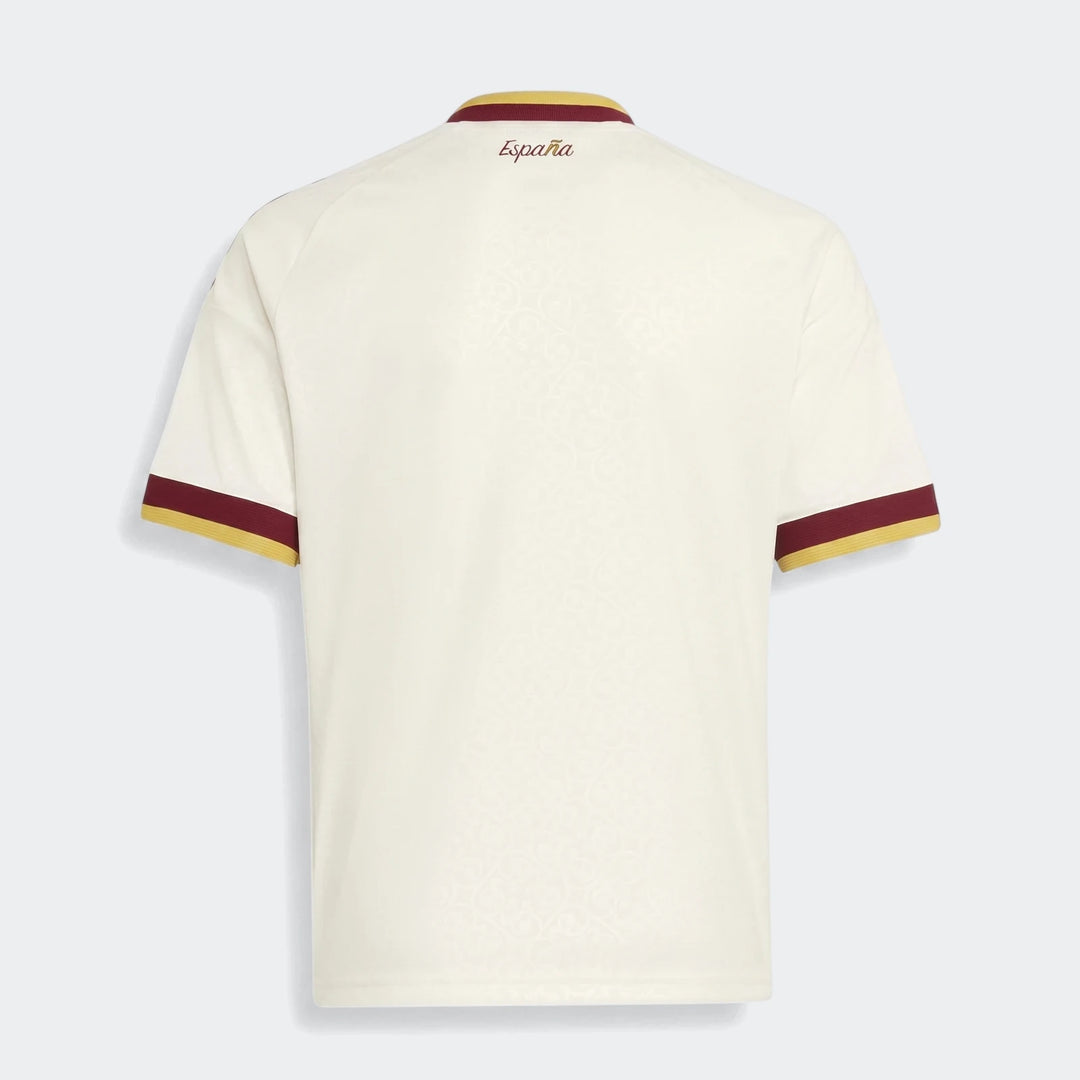 Back view of the youth Spain 25/26 Away Jersey in off-white with maroon and gold trim on the collar and sleeves.