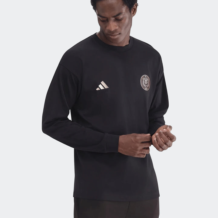 Black Sportswear Open Hem Essentials+ Slim Long Sleeve T-Shirt on a male model, front view.
