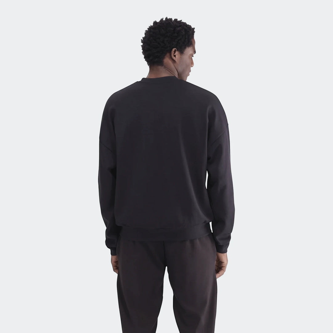 Sportswear Open Hem Future Icons 3-Bar Crew Sweatshirt in black, back view showing long sleeves and open hem.