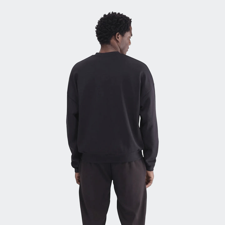 Sportswear Open Hem Future Icons 3-Bar Crew Sweatshirt in black, back view showing long sleeves and open hem.