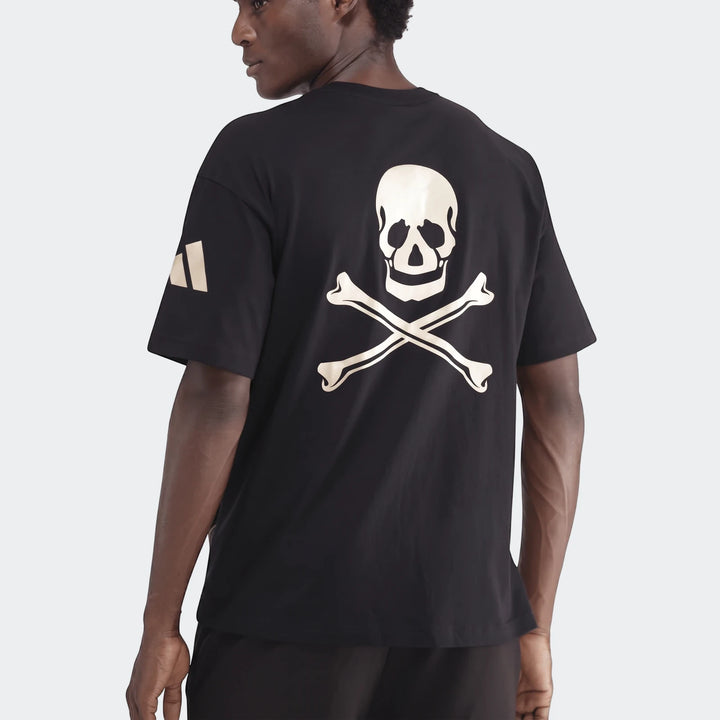 Rear view of a male model wearing a black Sportswear Open Hem Single Jersey T-Shirt with an off-white skull and crossbones