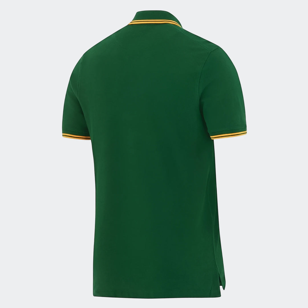 Back view of a dark green Spr Mnk Pique Polo Shirt featuring a yellow and orange striped collar and sleeve cuffs.