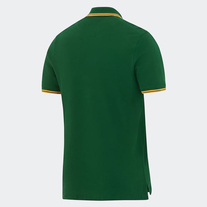 Back view of a dark green Spr Mnk Pique Polo Shirt featuring a yellow and orange striped collar and sleeve cuffs.