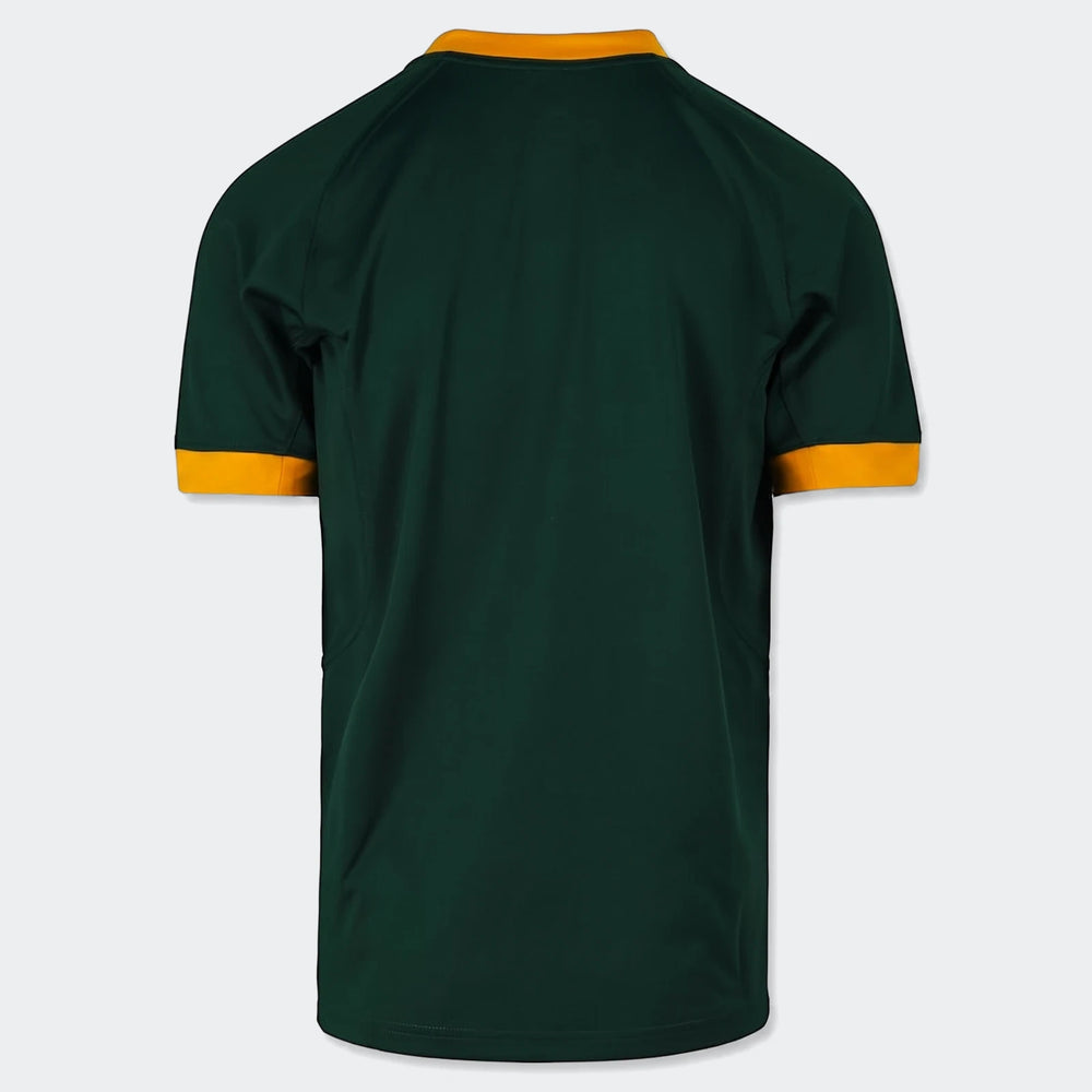 Back view of a dark green Spr Mnk Stdm Ss Jsy 7S Hm short-sleeved jersey, with orange and gold trim on collar and cuffs.