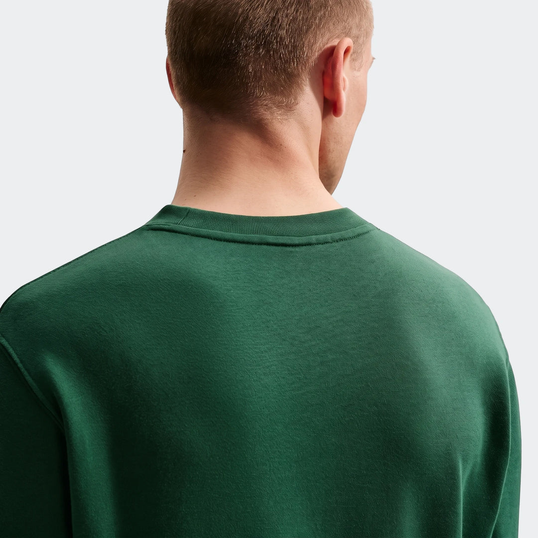 Springboks Men's French Terry Crew sweatshirt in dark green, shown from the back on a male model, highlighting the casual