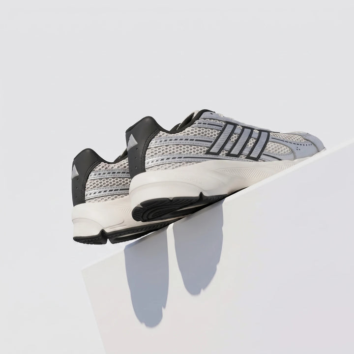 Technochaos 2000 Shoes in gray and black mesh with white cushioned sole, shown from side view as a pair.