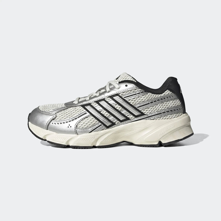 Silver, white, and black mesh and metallic Adidas Technochaos 2000 athletic sneaker in a side profile view.