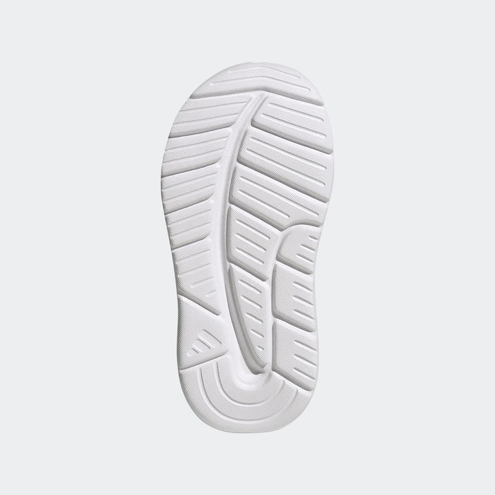 Infants' Tensaur Run 4.0 Shoes white rubber outsole, viewed from underneath, showcasing its distinctive textured tread